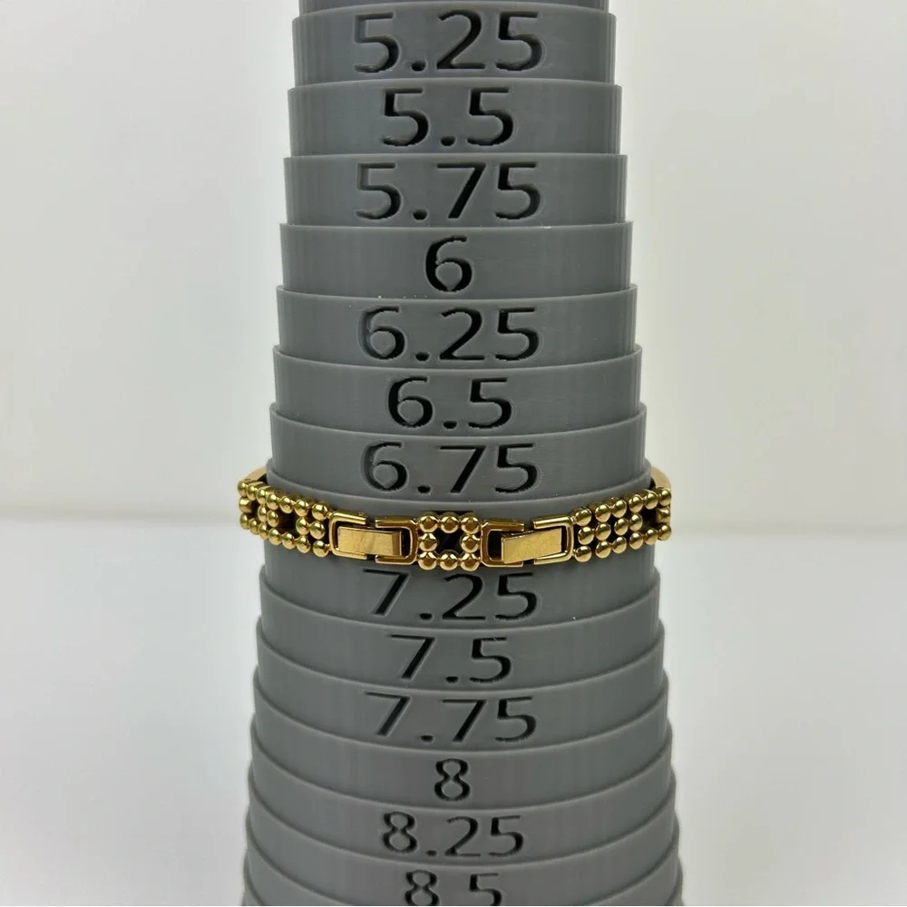 Elegant Avon Gold Tone Watch with Yellow Accents, 1